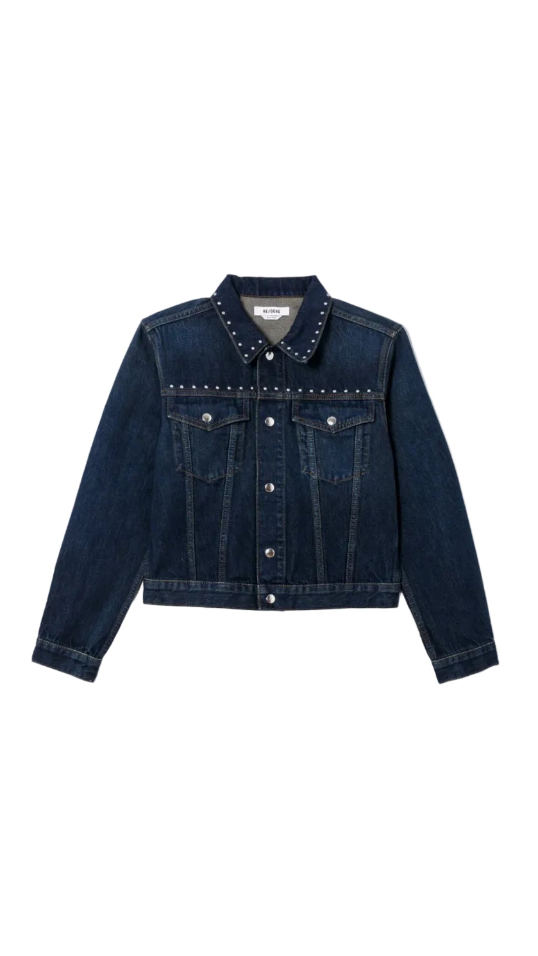 Denim jacket with studded details on a light gray background