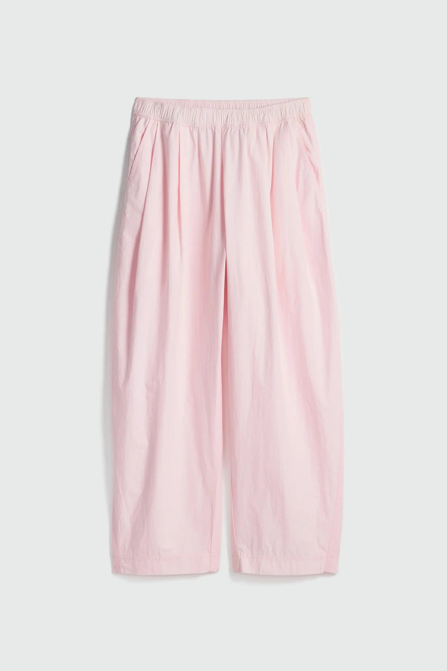 Pink wide-leg pants on a light gray background