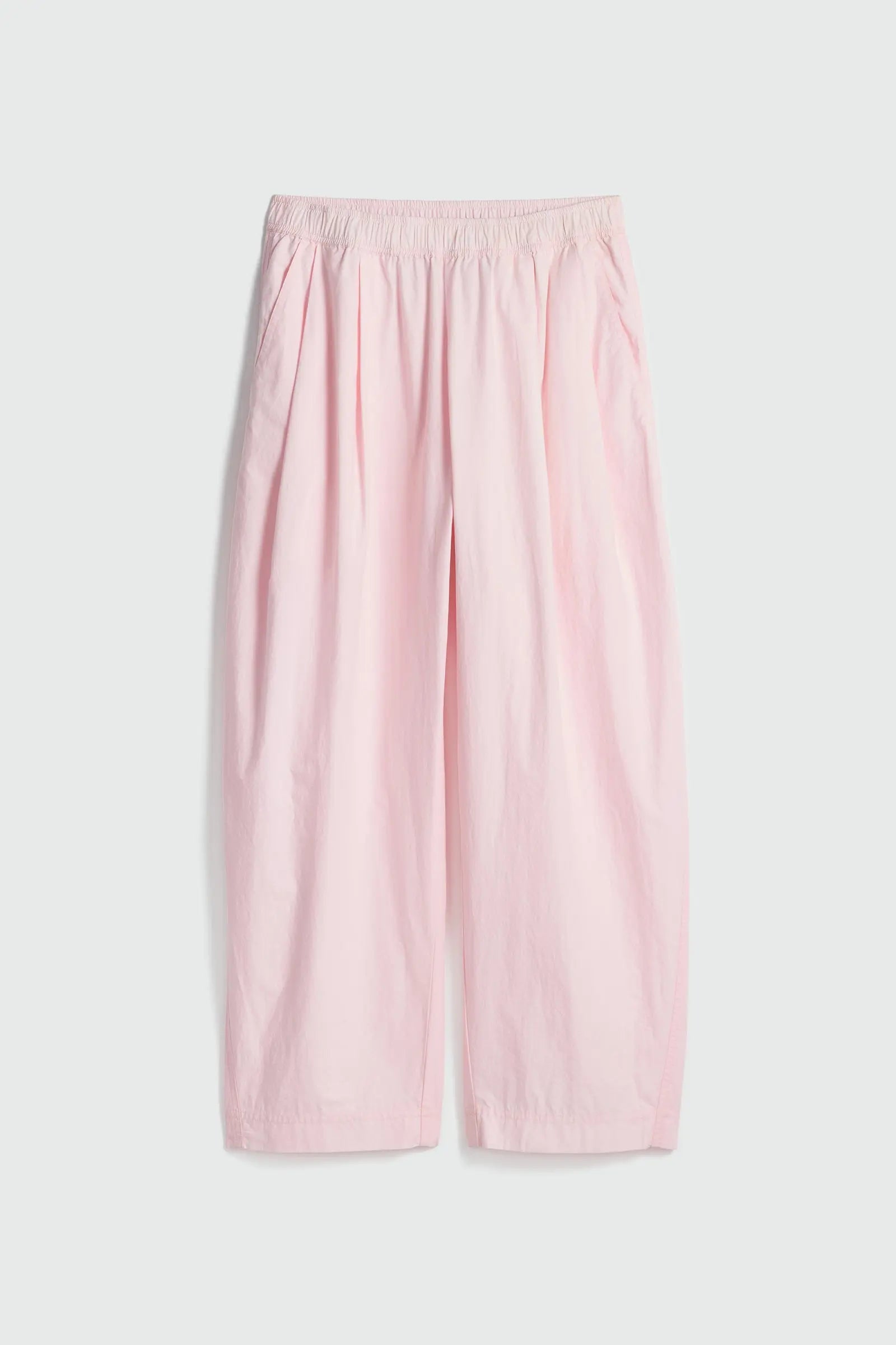 Pink wide-leg pants on a light gray background