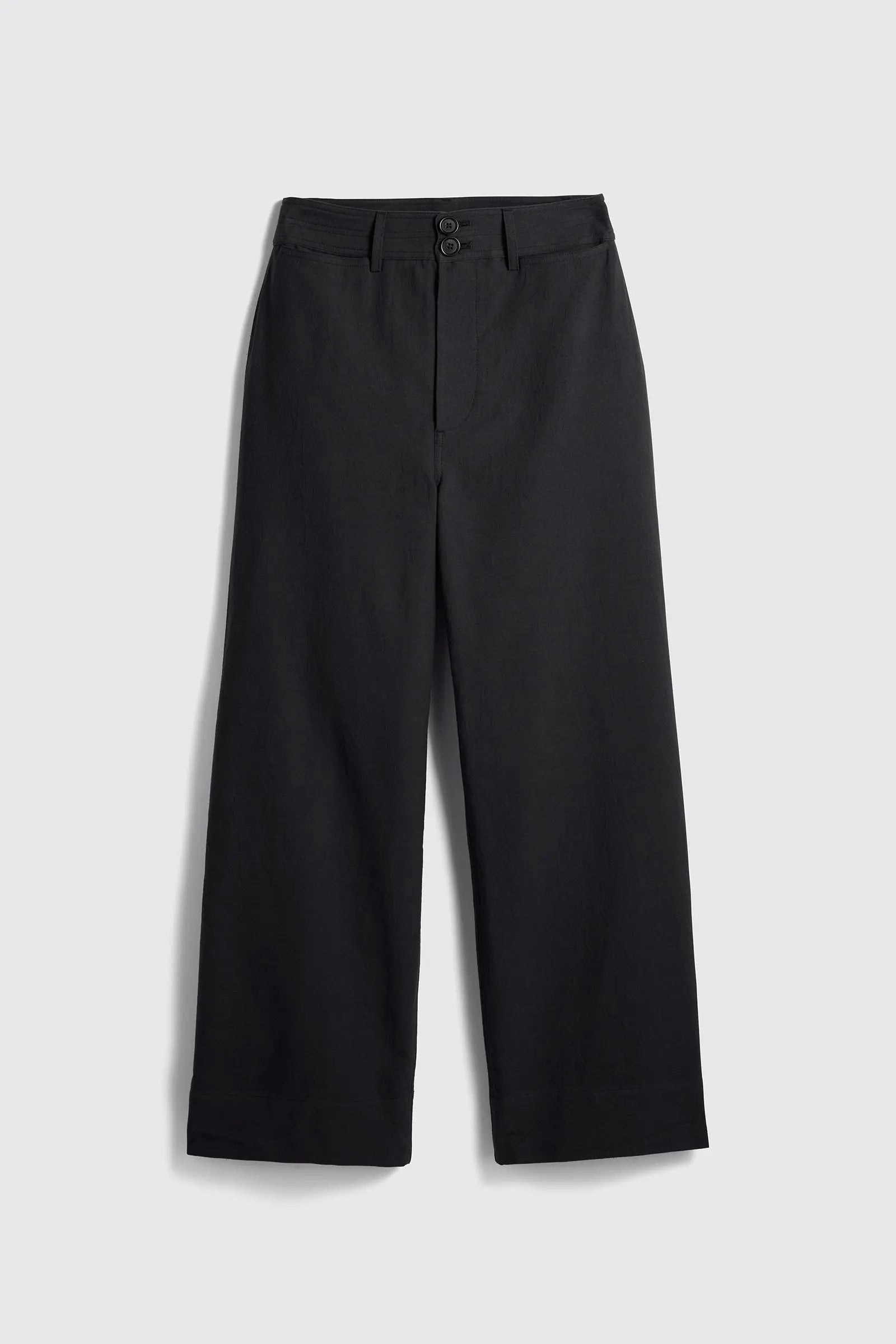 Black pants on a light gray background