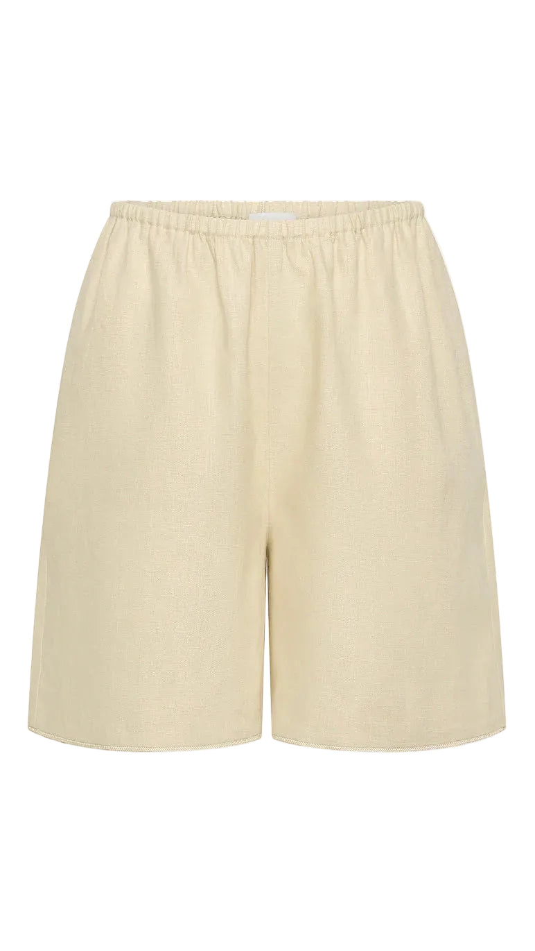 Beige shorts on a white background